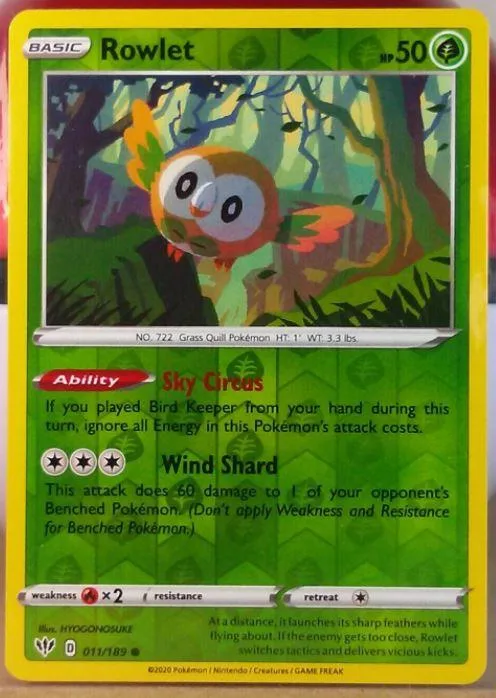 Rowlet reverse holo card front, Darkness Ablaze 11/189
