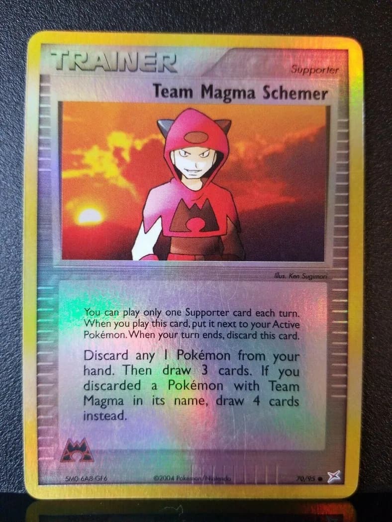 Team Magma Schemer reverse holo card front, EX Team Magma vs Team Aqua 70/95