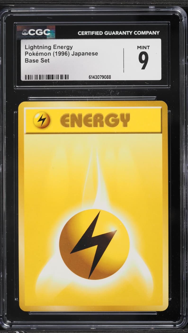 Japanese Expansion Pack Lightning Energy; representative unnumbered card in a slab. Edition and finish may differ; catalog ordinal is not printed on the card. Slab grade, serial, ownership and sale are not catalog evidence.