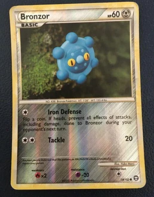 Bronzor reverse holo card front, Triumphant 58/102