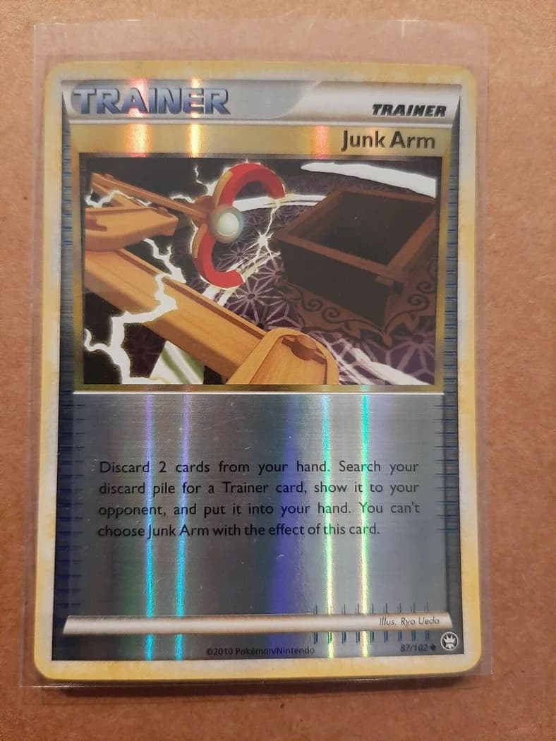Junk Arm reverse holo card front, Triumphant 87/102