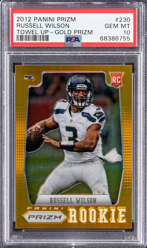 2012 Panini Prizm Towel Up Gold Prizm Russell Wilson #230 /10 card front