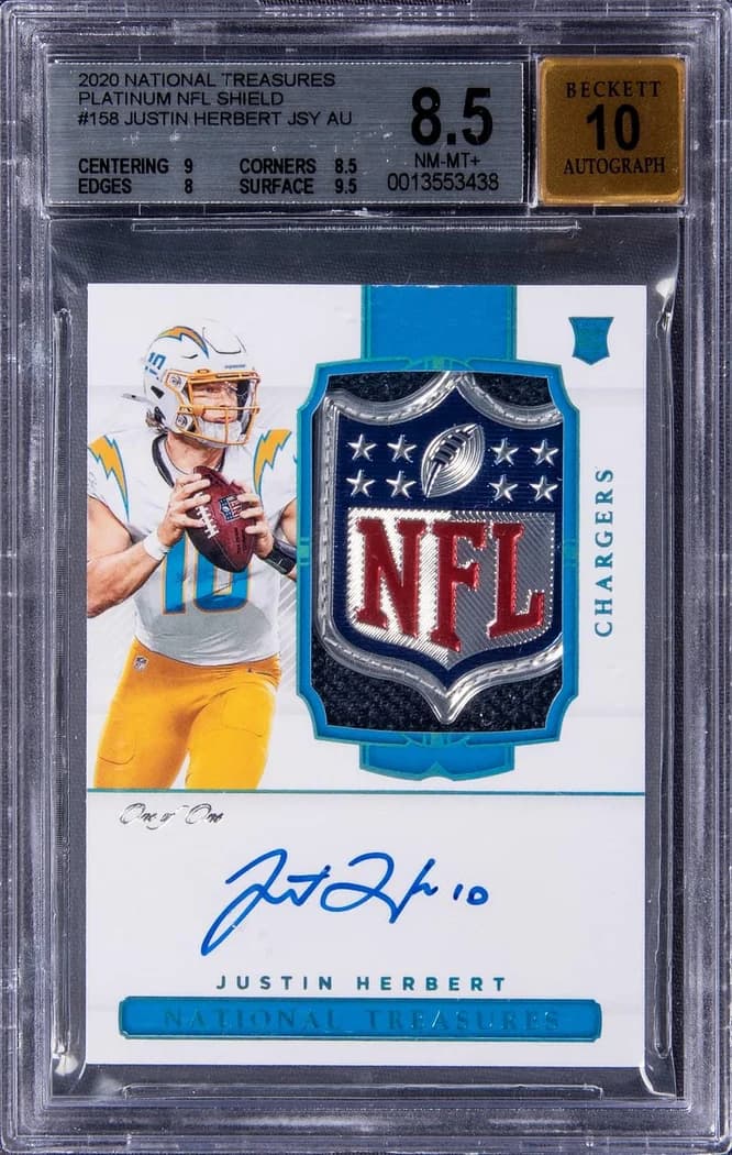 2020 Panini National Treasures Rookie Patch Autograph Platinum NFL Shield Justin Herbert #158 1/1 card front
