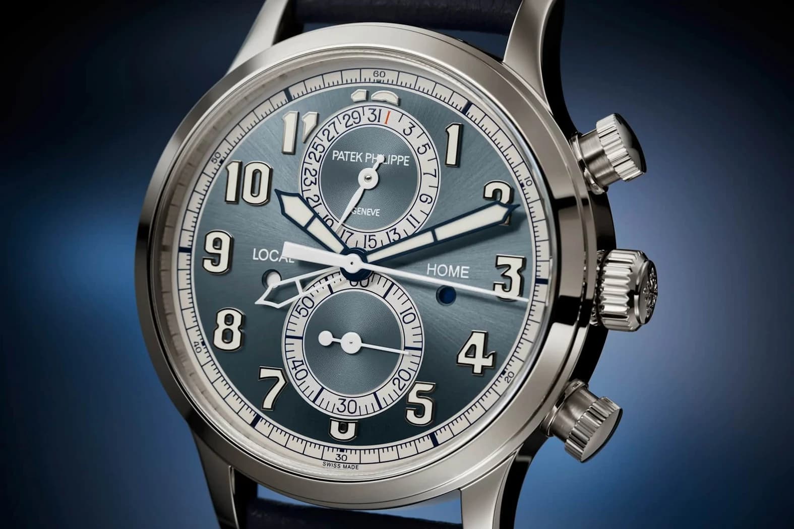 Patek Philippe Calatrava Pilot Travel Time Flyback Chronograph (White gold, sunburst blue-gray dial), manufacturer image (not a photograph of an individual watch)